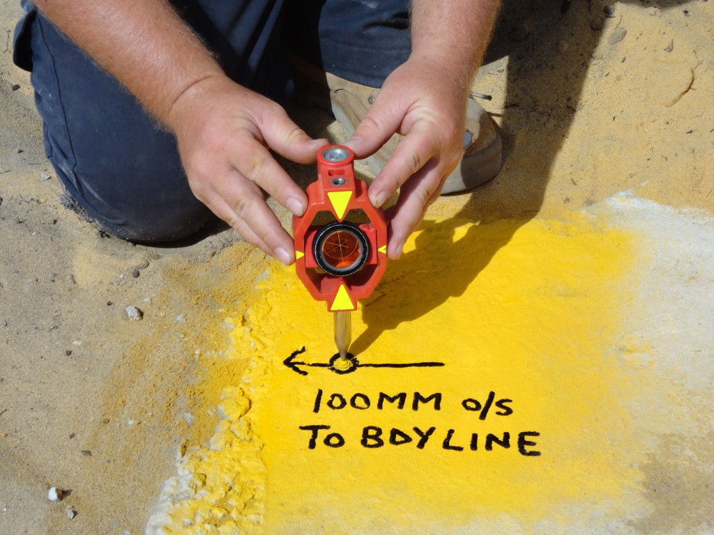 Surveyor at construction site