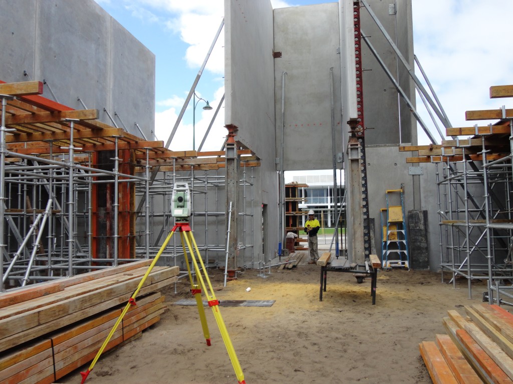 Surveying equipment set up at building site